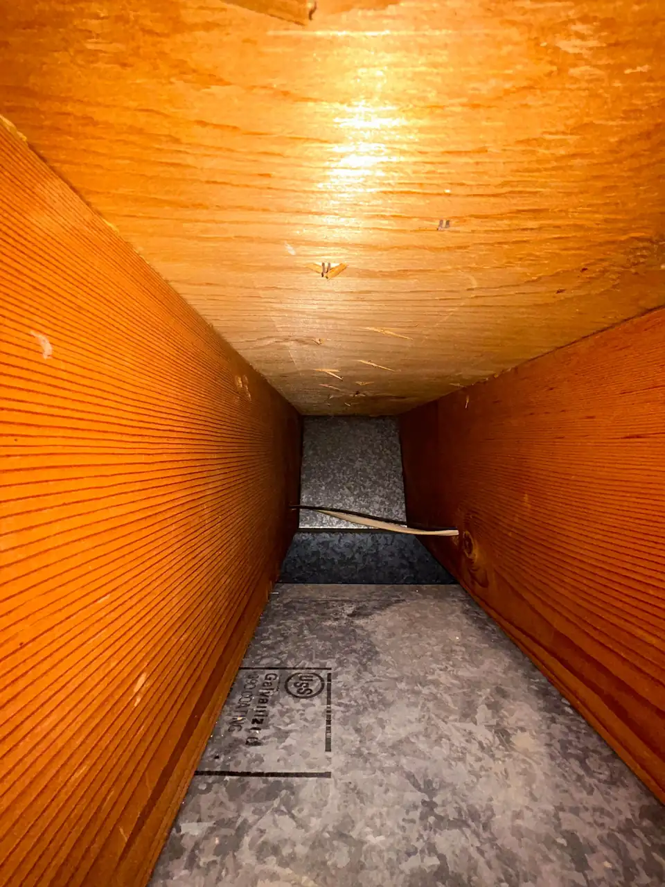 Inside a residential duct during cleaning