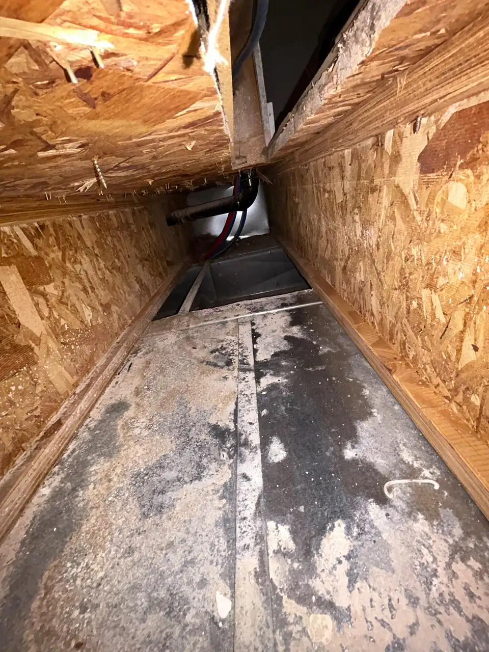 Looking down a main trunk line toward the furnace after cleaning